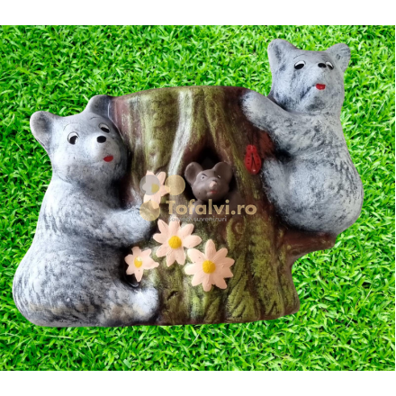 Tree stump with bear